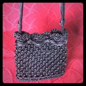 Cute beaded purse with shoulder strap and tassel